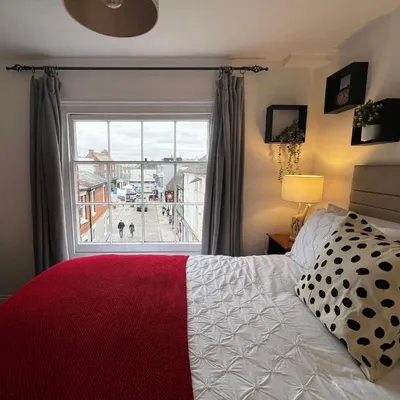 bedroom with view of the square