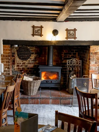 Fireside seating area at The Hunters Inn in Romsey